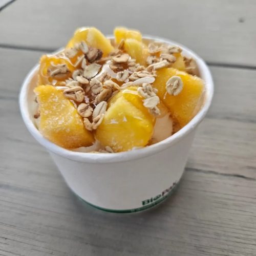 This RU Okay Day, Joey Zaza's slings breakfast bundles including a limited-edition bright yellow Bircher Muesli cup topped with mango chunks and fiber-rich oats.