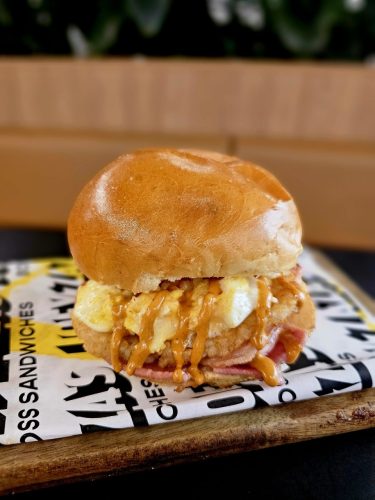 A smashing hit, our hashbrown sandwich with juicy bacon is a sure safe food for kids on their school holiday. (Also their parents.)
