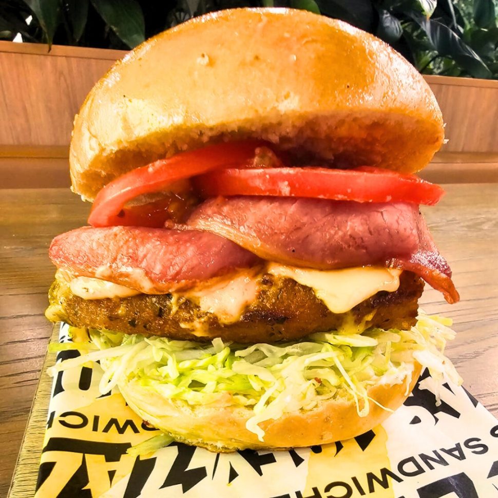 The JayZee Hot Chick fried chicken burger combining everything you love from BLT, TLC, and chicken sandwiches in a plump brioche bun.