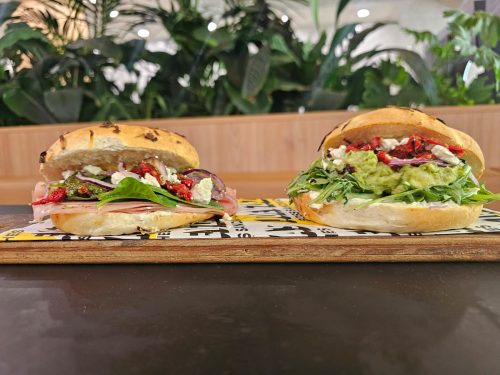 Our breakfast catering package for Christmas 2025. Get these limited-edition breakfast bagels for your office catering needs. Left: Merry Mortadella bagel. Right: Holly Avo bagel. Delivers within Perth CBD and nearby subrubs.