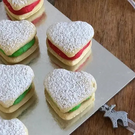 Festive Christmas-themed shortbread cookies with red and green filling, perfect for your year-end events in Perth CBD and nearby suburbs. Order from Joey Zaza's Xmas office catering.